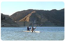 Kayaking in front of the historical Bridge wall at Hanna Lake